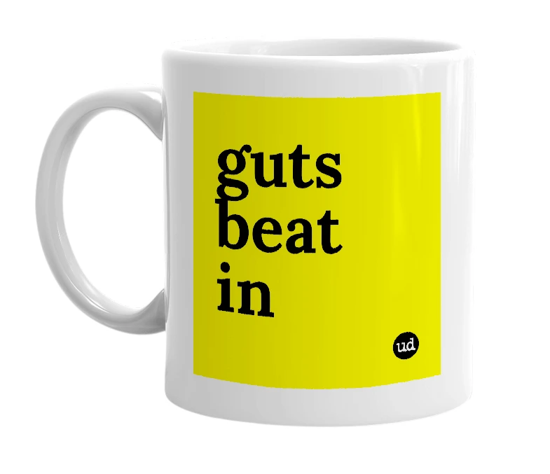 White mug with 'guts beat in' in bold black letters