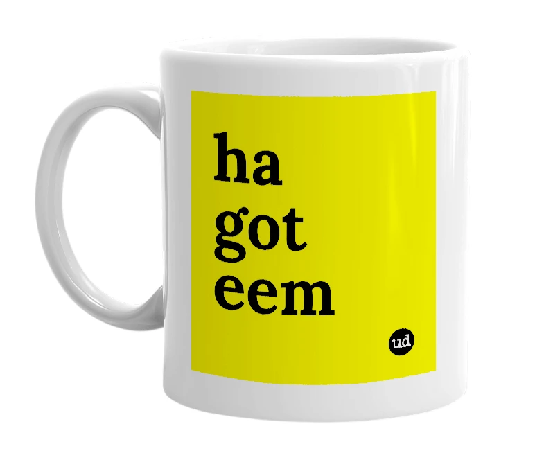 White mug with 'ha got eem' in bold black letters