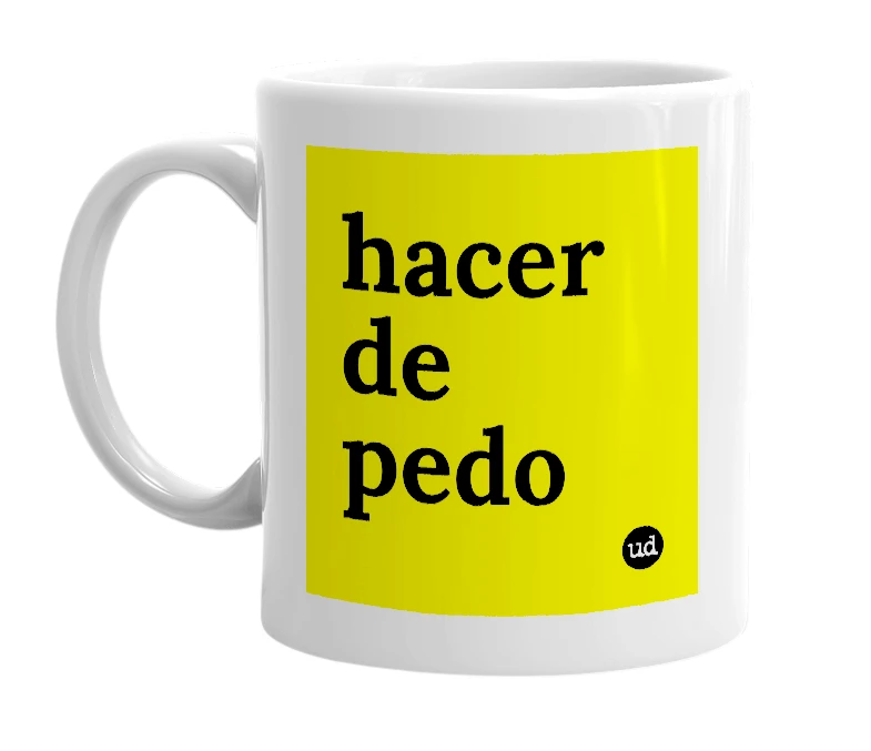 White mug with 'hacer de pedo' in bold black letters