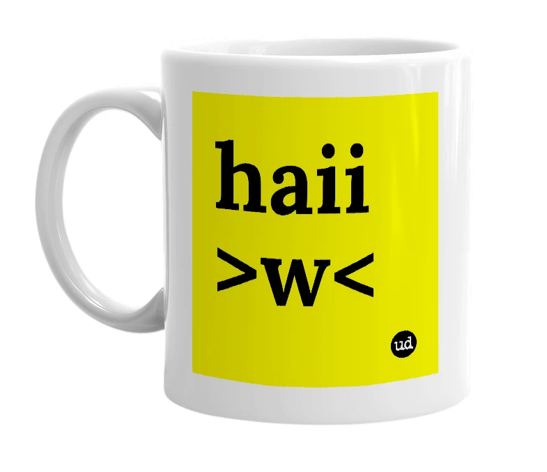 White mug with 'haii >w<' in bold black letters