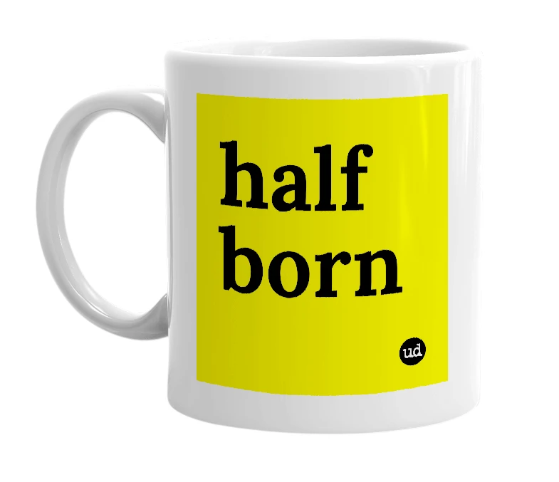 White mug with 'half born' in bold black letters