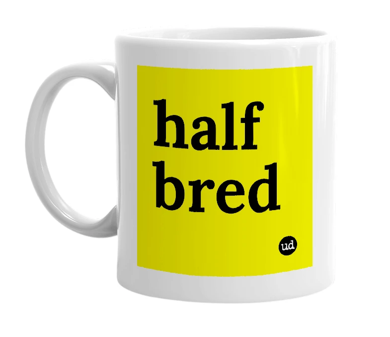 White mug with 'half bred' in bold black letters