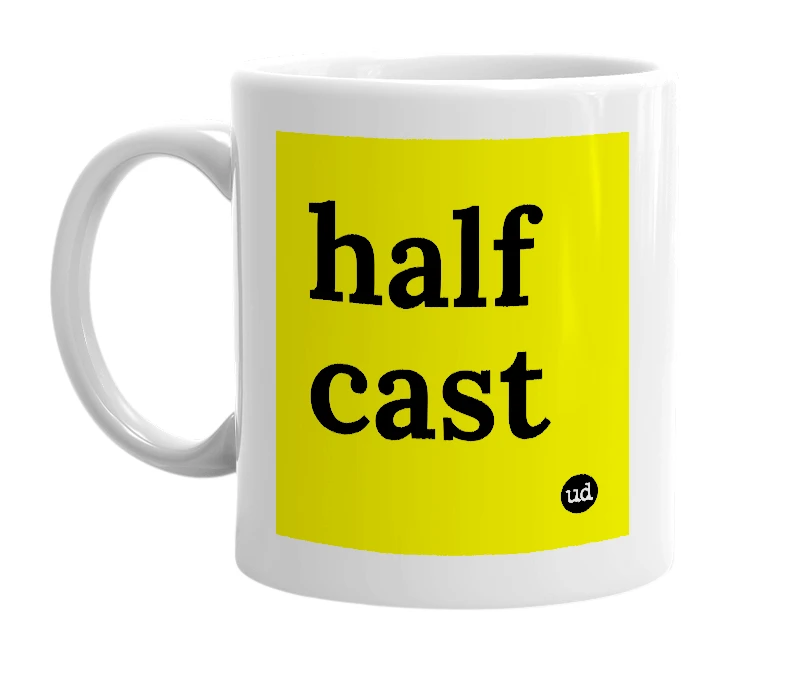 White mug with 'half cast' in bold black letters