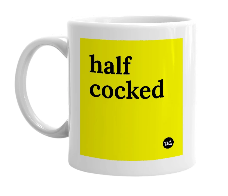 White mug with 'half cocked' in bold black letters