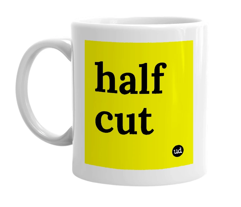 White mug with 'half cut' in bold black letters