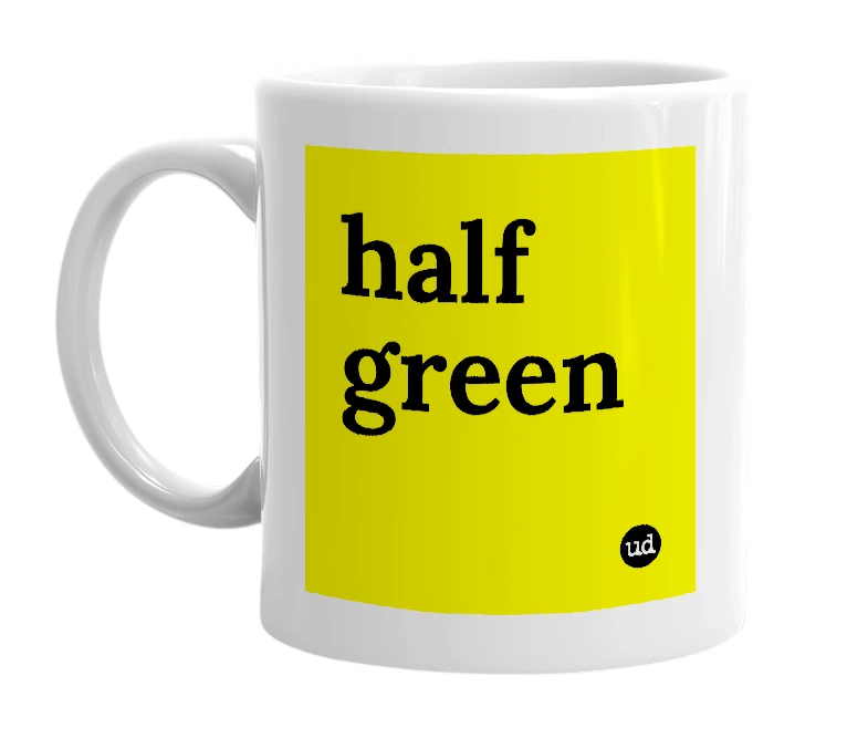 White mug with 'half green' in bold black letters