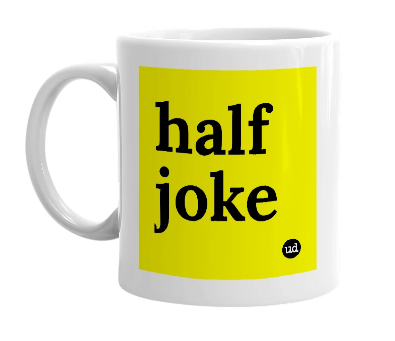 White mug with 'half joke' in bold black letters