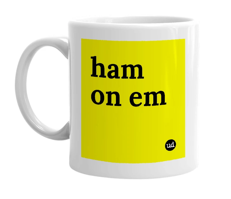 White mug with 'ham on em' in bold black letters