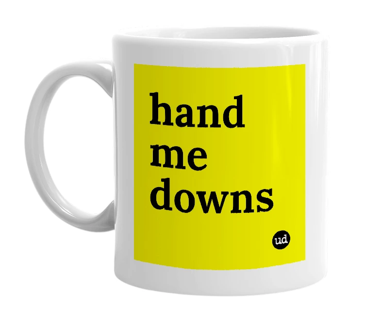 White mug with 'hand me downs' in bold black letters