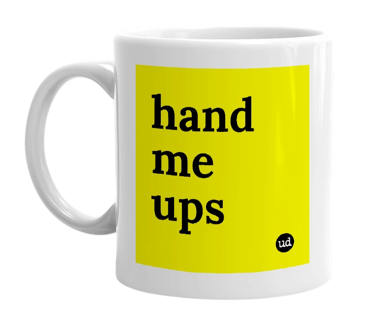 White mug with 'hand me ups' in bold black letters