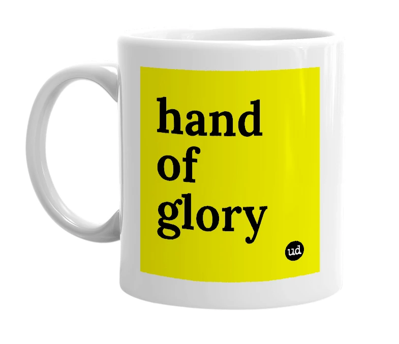 White mug with 'hand of glory' in bold black letters