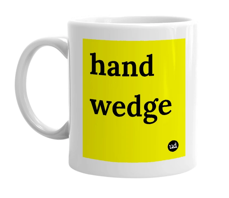 White mug with 'hand wedge' in bold black letters