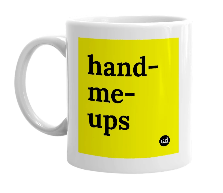 White mug with 'hand-me-ups' in bold black letters