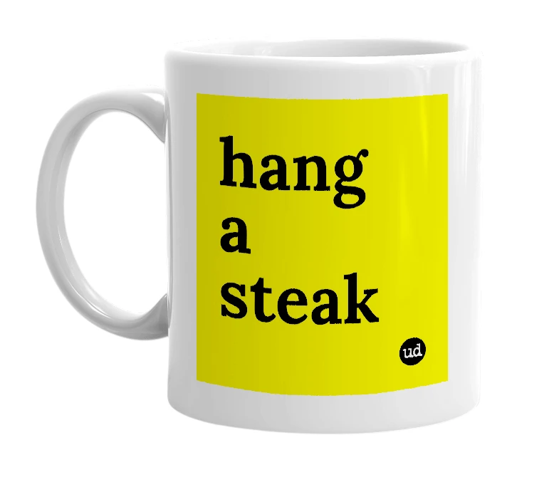 White mug with 'hang a steak' in bold black letters