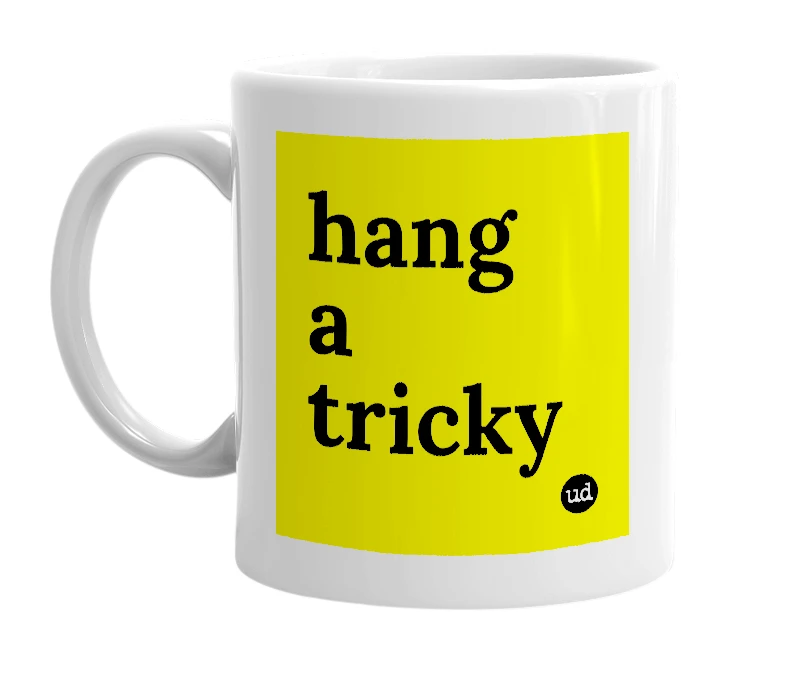 White mug with 'hang a tricky' in bold black letters