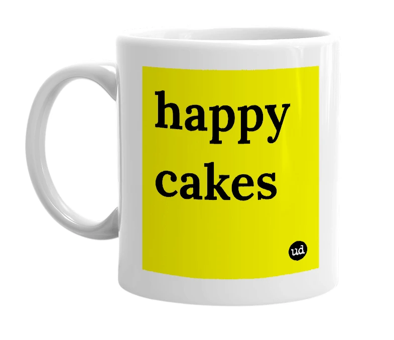 White mug with 'happy cakes' in bold black letters