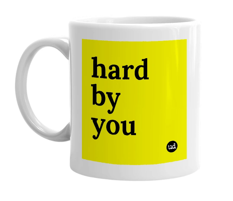 White mug with 'hard by you' in bold black letters