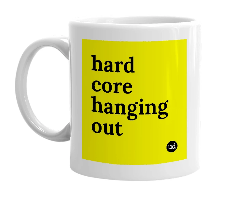 White mug with 'hard core hanging out' in bold black letters