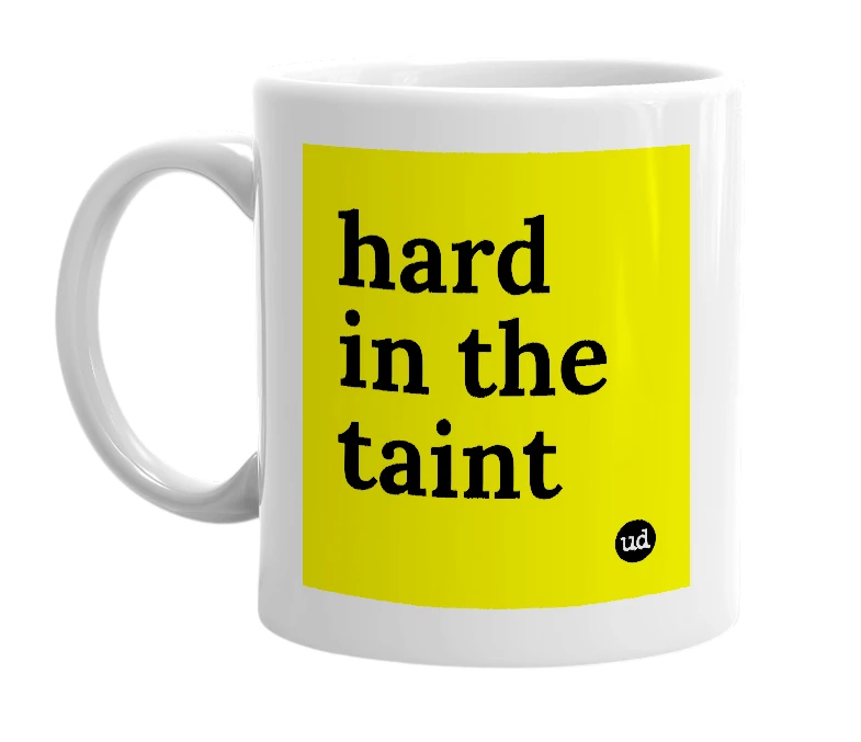 White mug with 'hard in the taint' in bold black letters