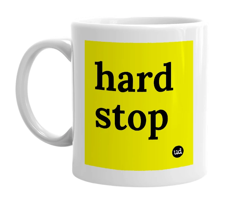 White mug with 'hard stop' in bold black letters