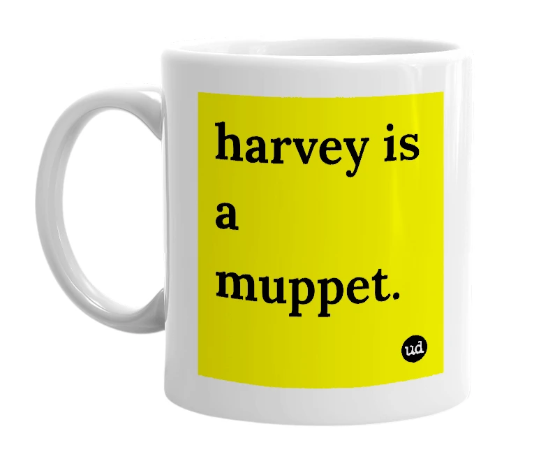 White mug with 'harvey is a muppet.' in bold black letters