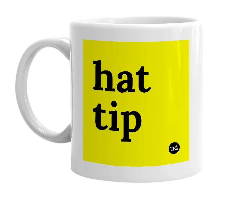 White mug with 'hat tip' in bold black letters
