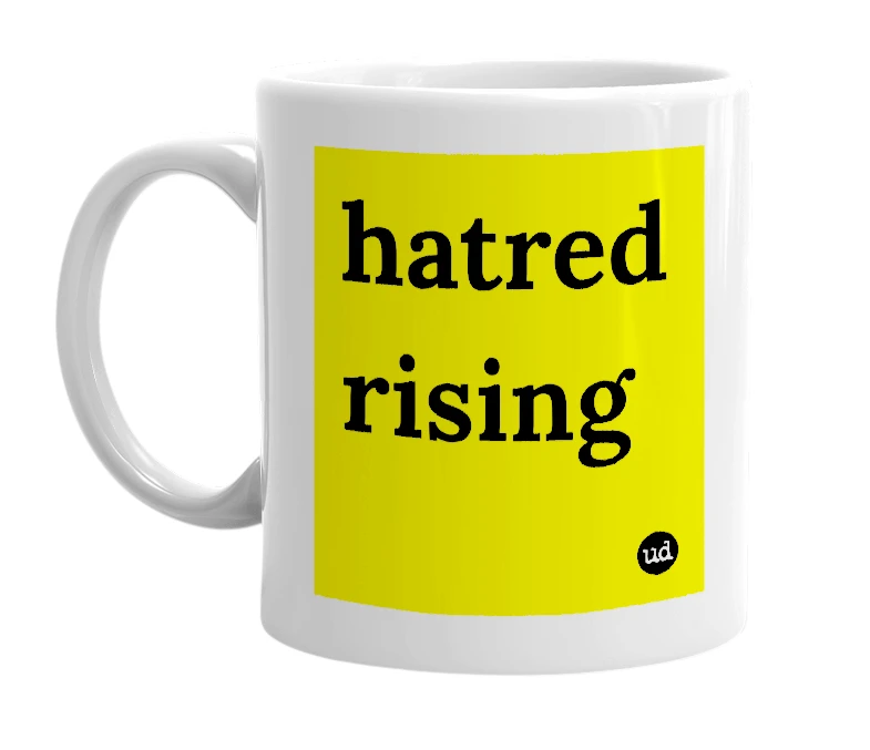 White mug with 'hatred rising' in bold black letters