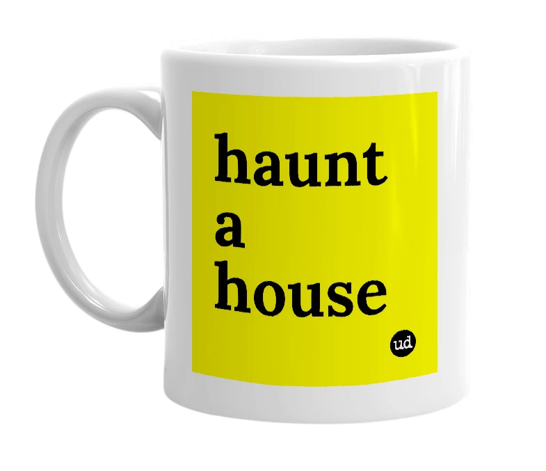 White mug with 'haunt a house' in bold black letters