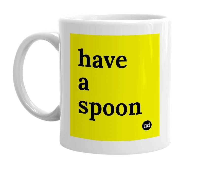 White mug with 'have a spoon' in bold black letters