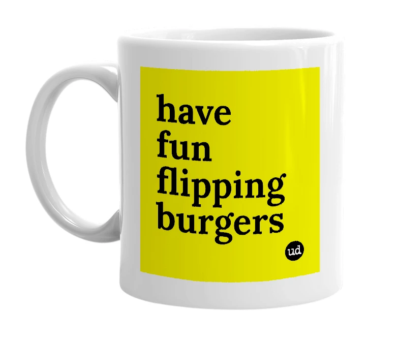 White mug with 'have fun flipping burgers' in bold black letters