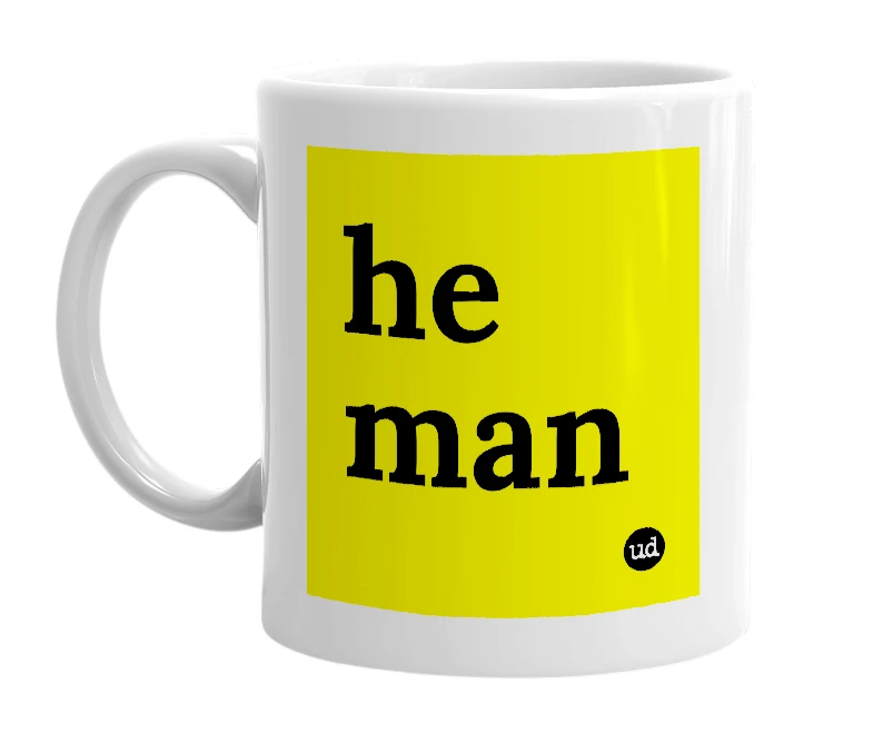 White mug with 'he man' in bold black letters