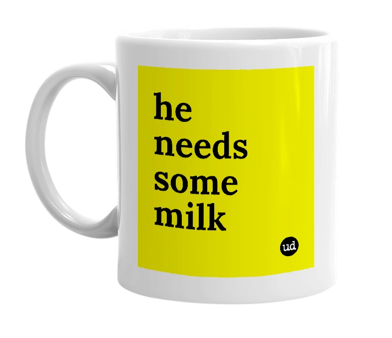 White mug with 'he needs some milk' in bold black letters