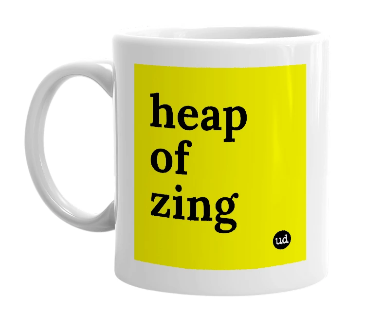 White mug with 'heap of zing' in bold black letters