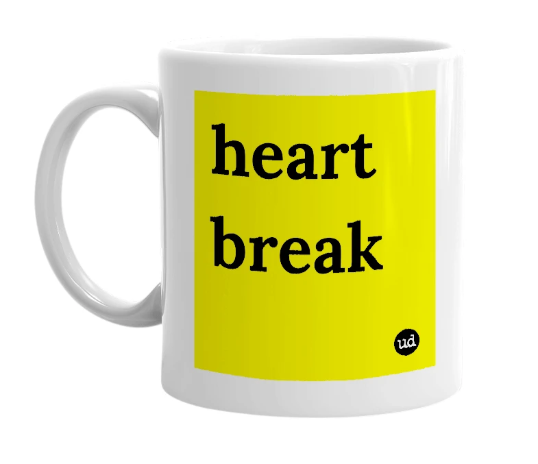 White mug with 'heart break' in bold black letters