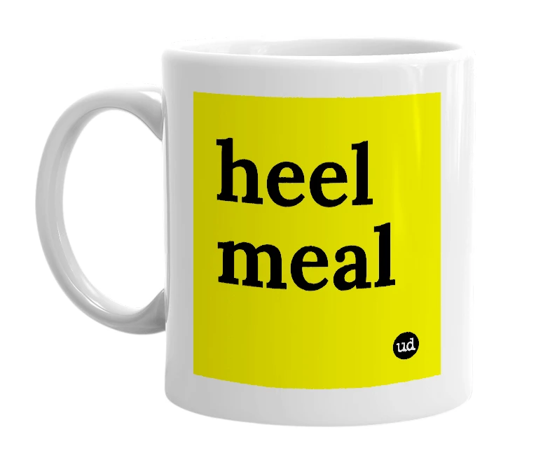 White mug with 'heel meal' in bold black letters