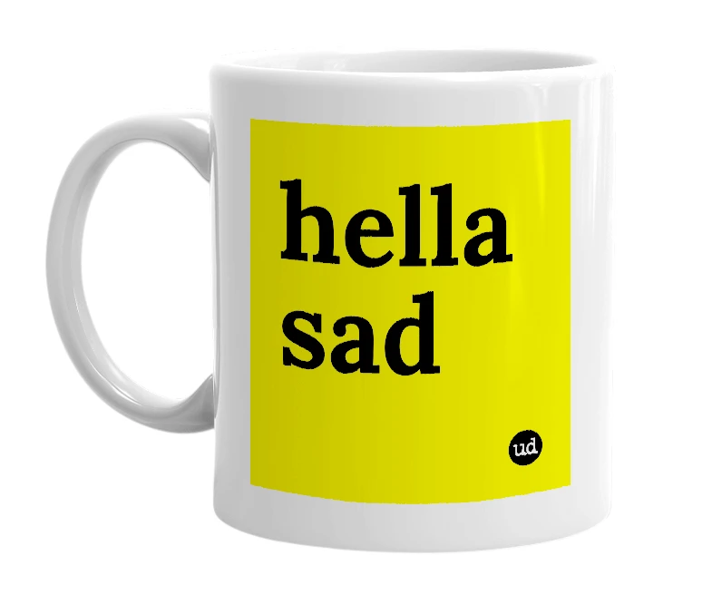 White mug with 'hella sad' in bold black letters