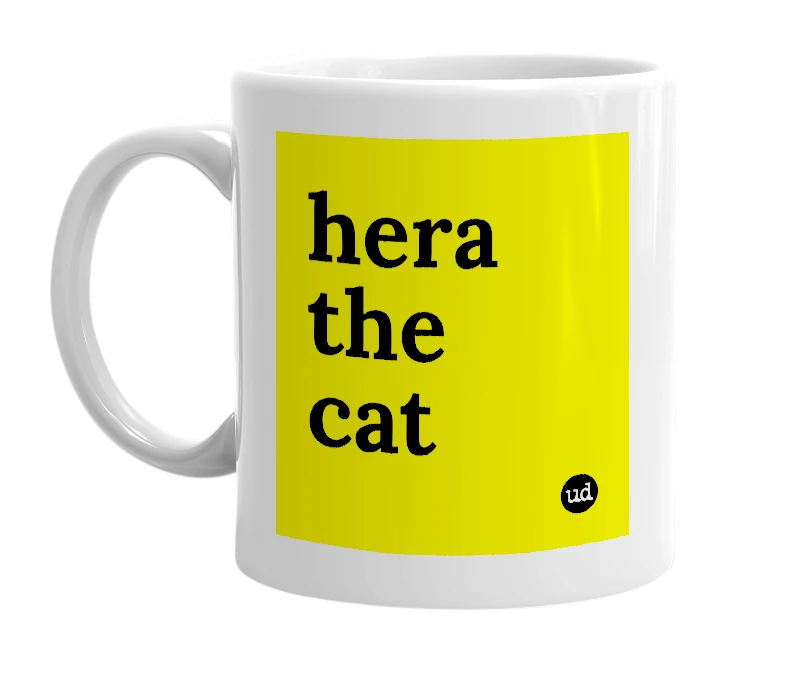 White mug with 'hera the cat' in bold black letters