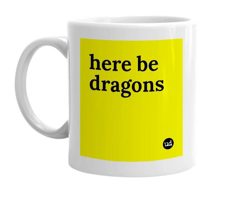 White mug with 'here be dragons' in bold black letters