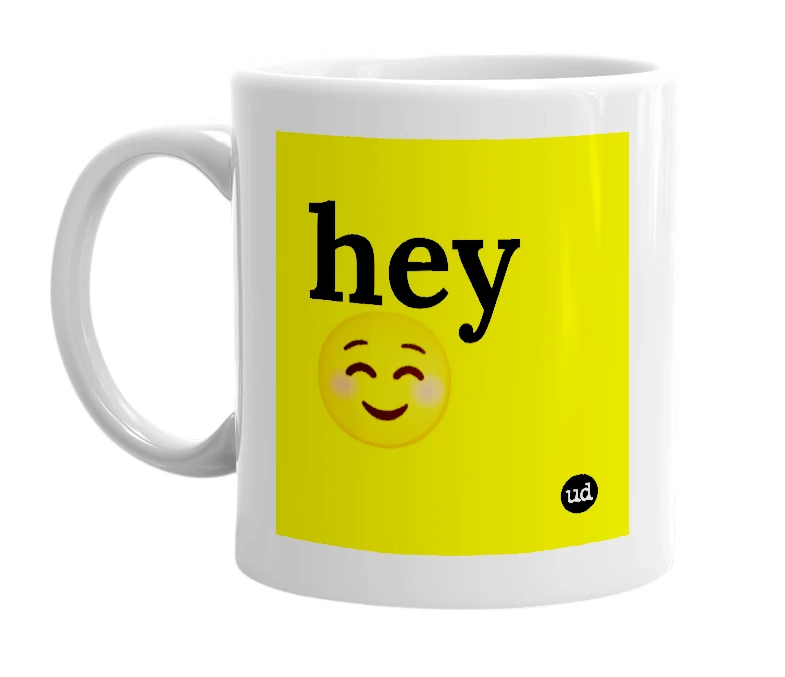 White mug with 'hey☺️' in bold black letters