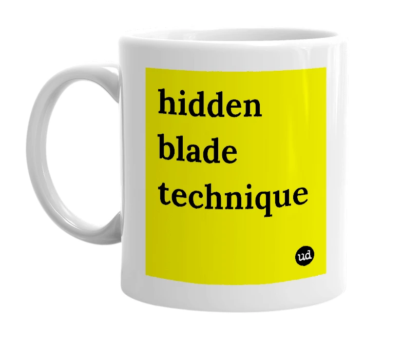 White mug with 'hidden blade technique' in bold black letters