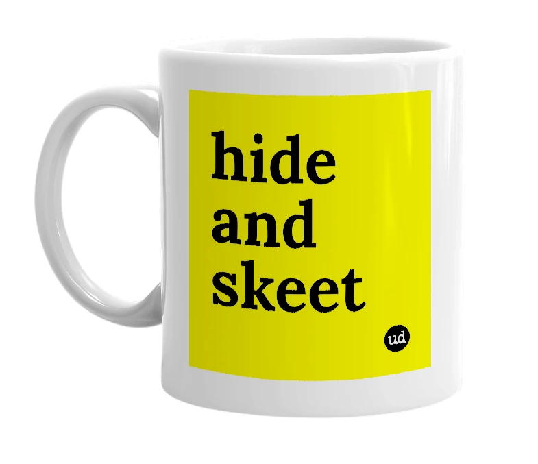 White mug with 'hide and skeet' in bold black letters