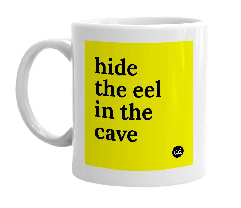 White mug with 'hide the eel in the cave' in bold black letters