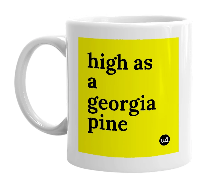 White mug with 'high as a georgia pine' in bold black letters