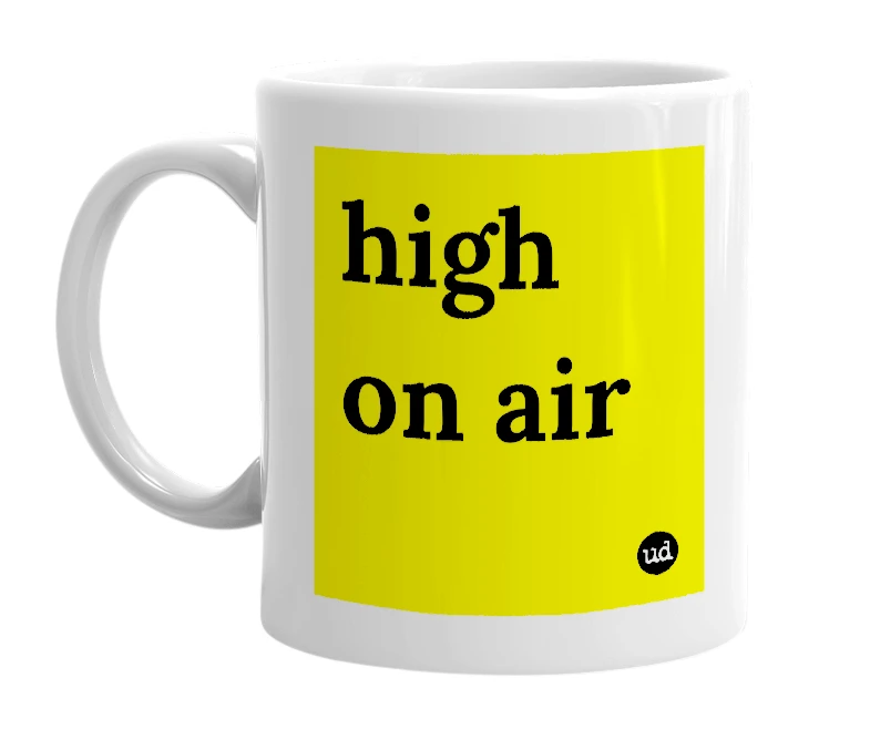 White mug with 'high on air' in bold black letters