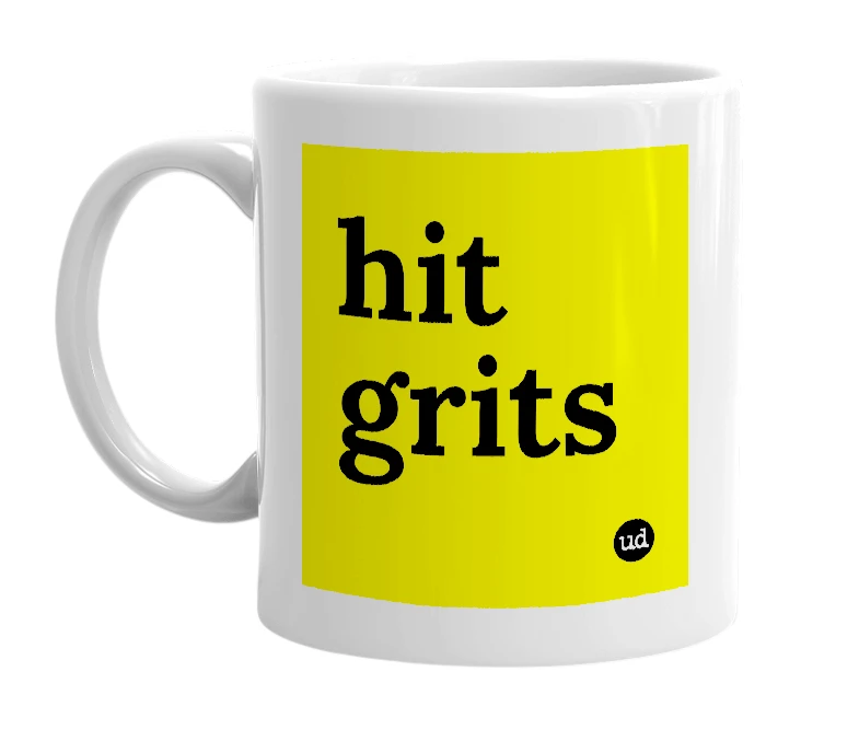 White mug with 'hit grits' in bold black letters