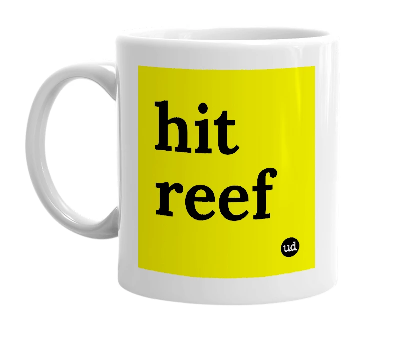 White mug with 'hit reef' in bold black letters