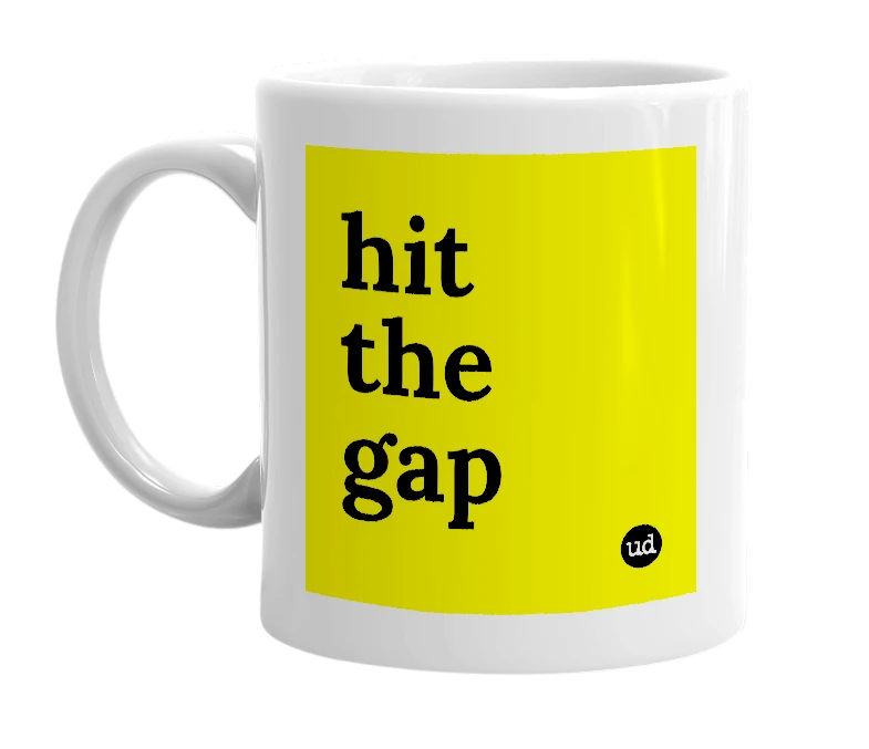 White mug with 'hit the gap' in bold black letters