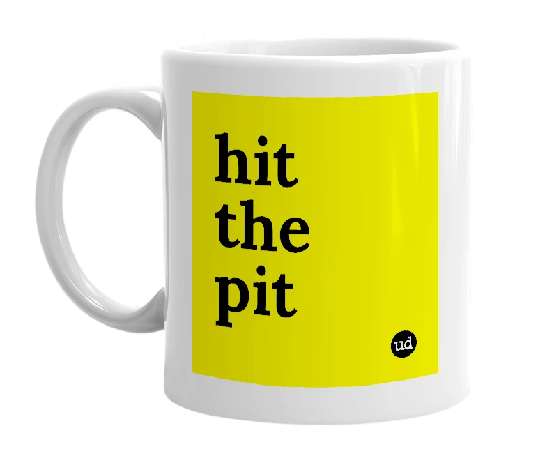 White mug with 'hit the pit' in bold black letters