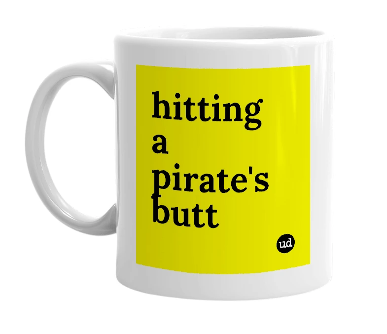 White mug with 'hitting a pirate's butt' in bold black letters