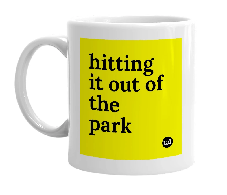 White mug with 'hitting it out of the park' in bold black letters